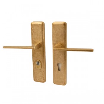 Veiligheidsset Qbe met deurkrukken Zenith messing getrommeld